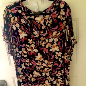 Capped sleeve summer top.  Dress up or down.